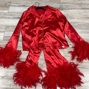 Feather Pjs never worn. Tags still attached
